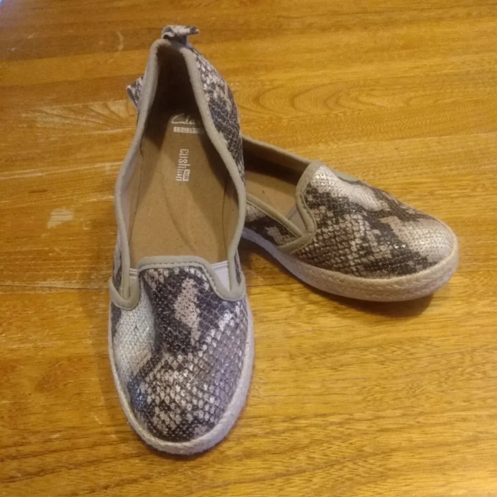 Clarks size 7 animal print slip on espadrilles. Comfort shoes.